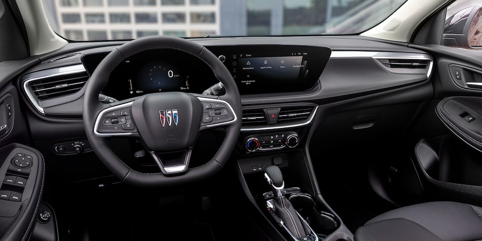 Buick Encore 2025, SUV compacta premium equipada con cargador inalámbrico para smartphone